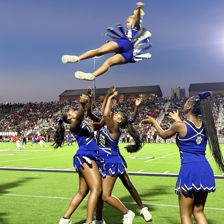 cheerleaders in the air