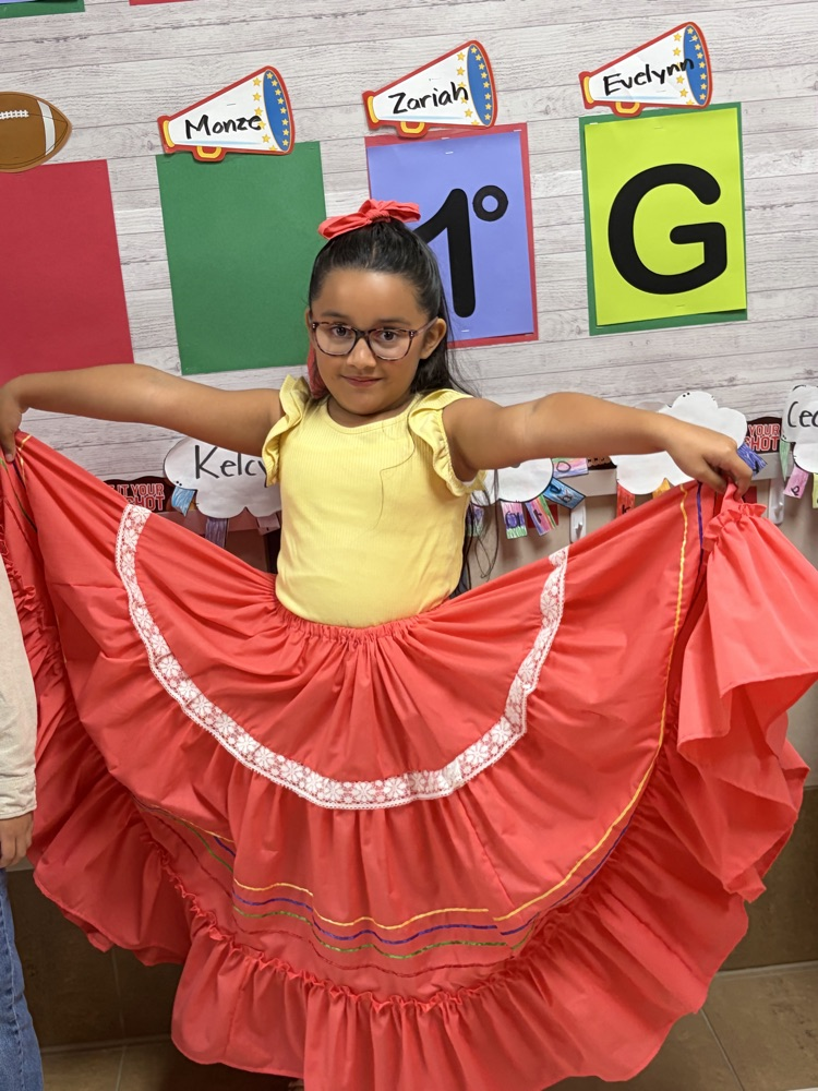 students dress in authentic Hispanic folkwear