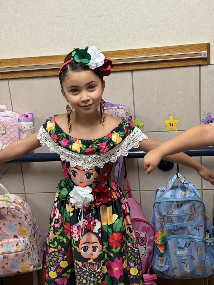 students dress in authentic Hispanic folkwear