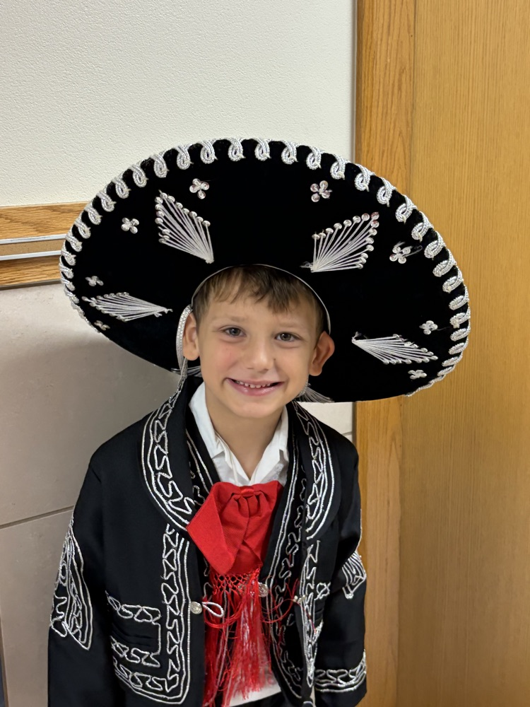 students dress in authentic Hispanic folkwear