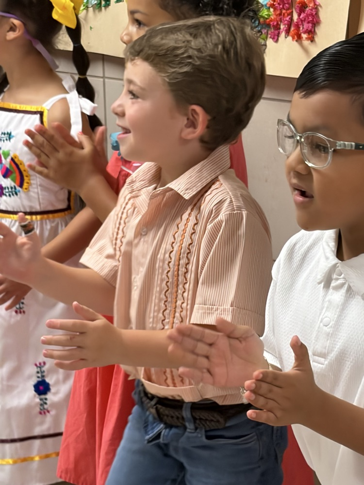 students dress in authentic Hispanic folkwear