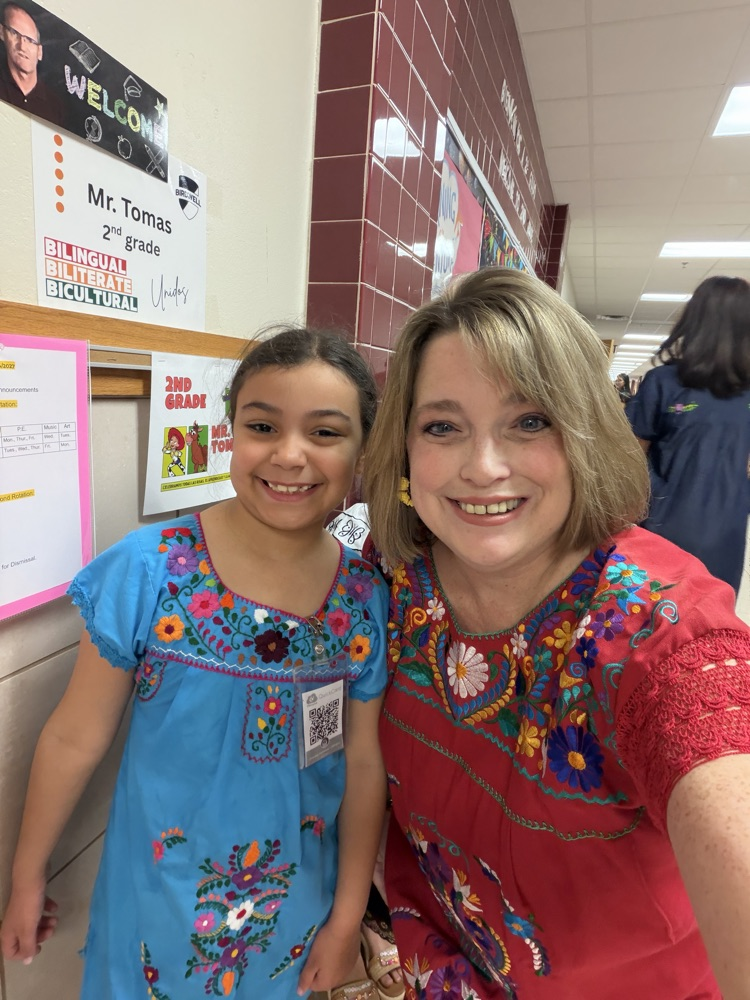 students dress in authentic Hispanic folkwear