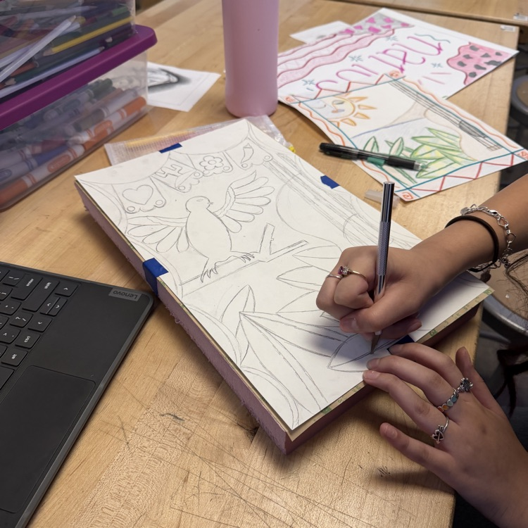 student working on art project 