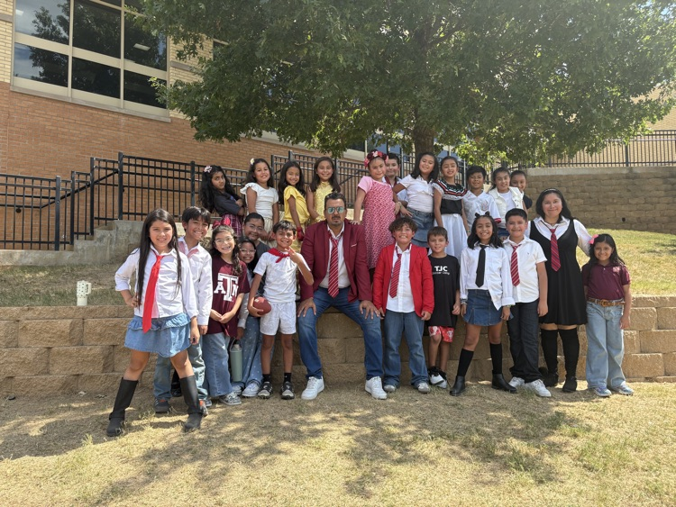 students on playground dressed up as fave artist
