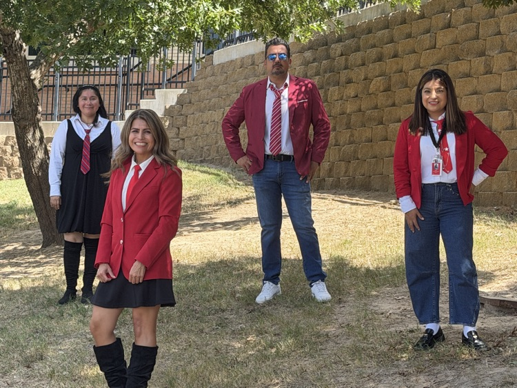 teachers dressed up in costume with tie
