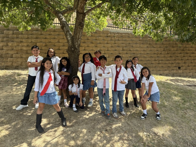 classroom picture on Playground with student dressed as favorite Hispanic artist