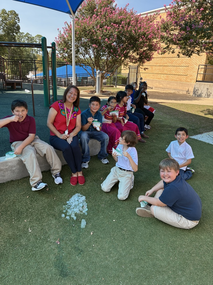 teacher with students on playground