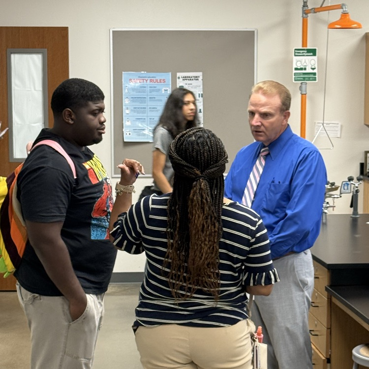parents and teachers talking at open house