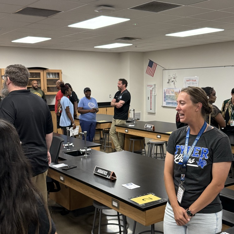 parents and teachers talking at open house