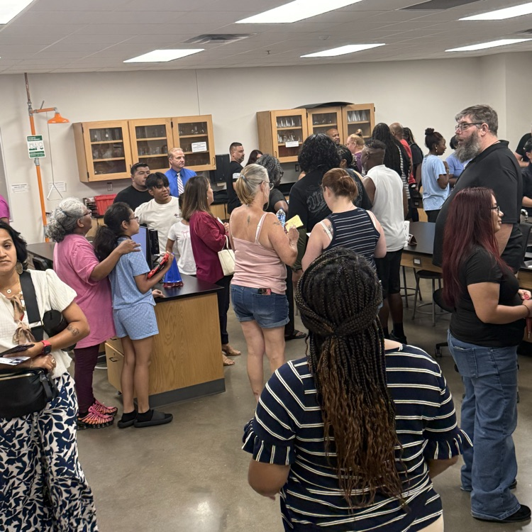 parents and teachers talking at open house