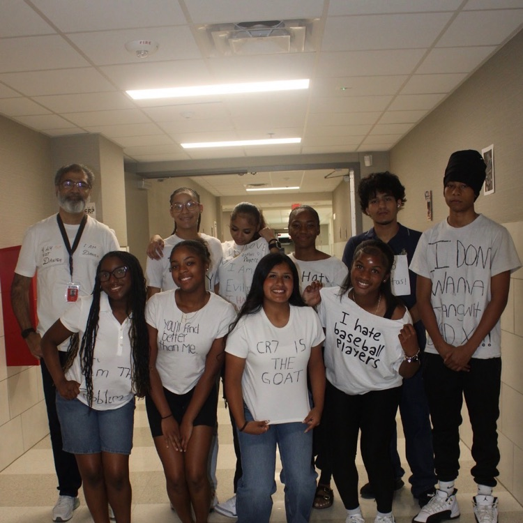 students with white tshirts on