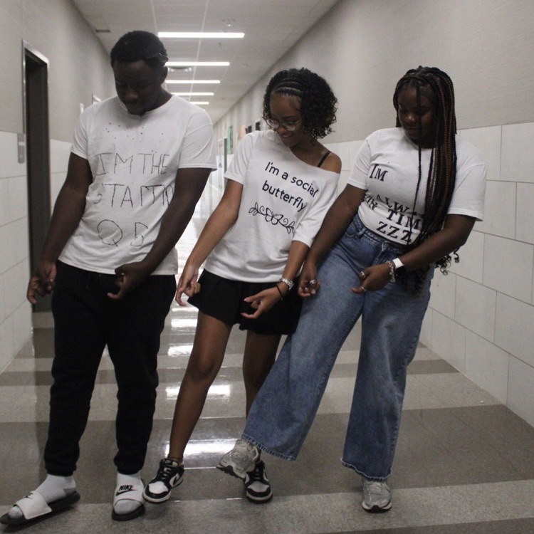 students with white tshirts on