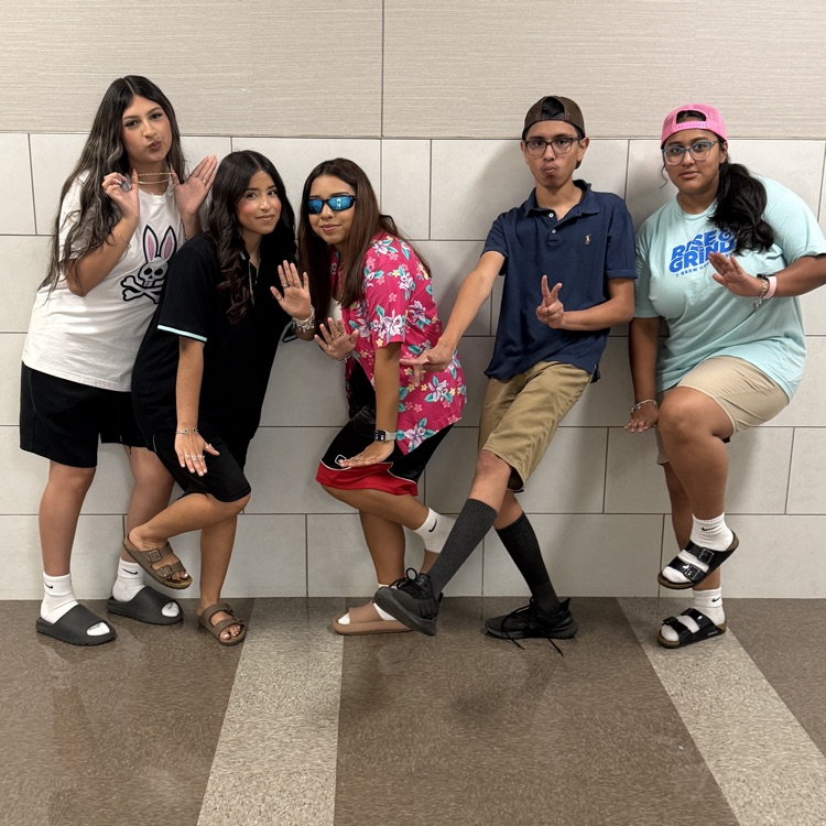 students posing for pictures 