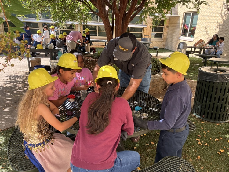 kids working with concrete outside