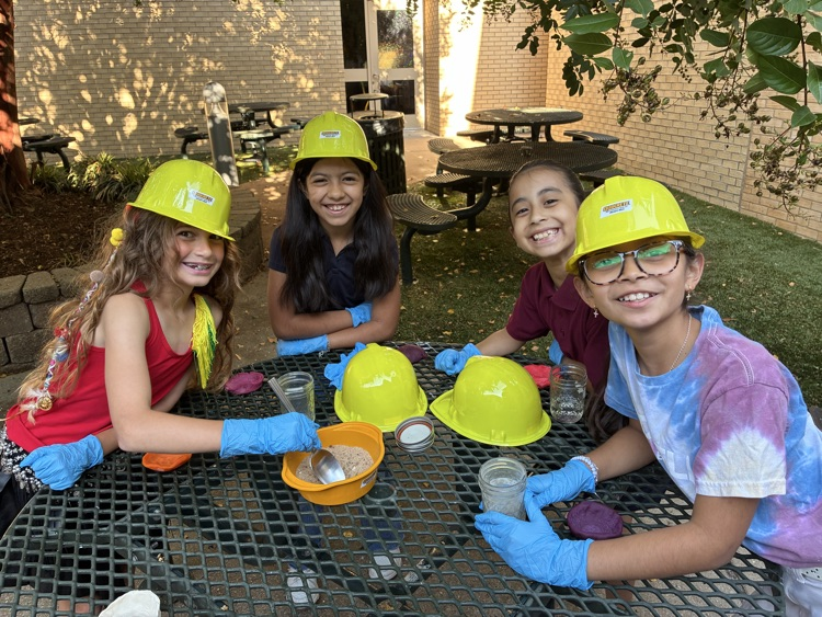 kids working with concrete outside