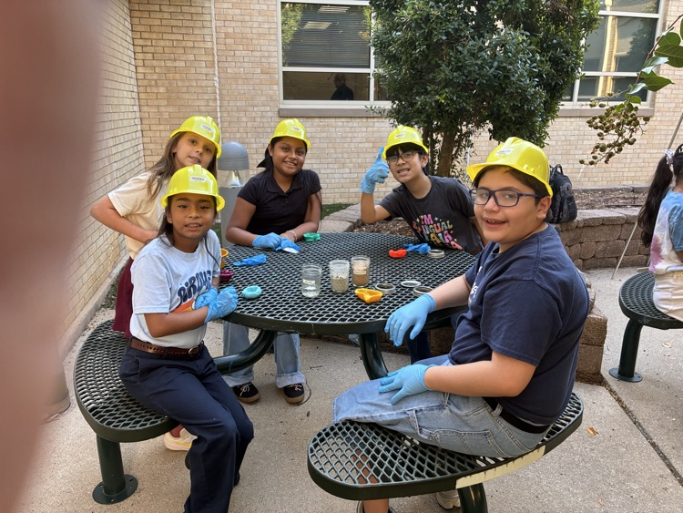kids working with concrete outside