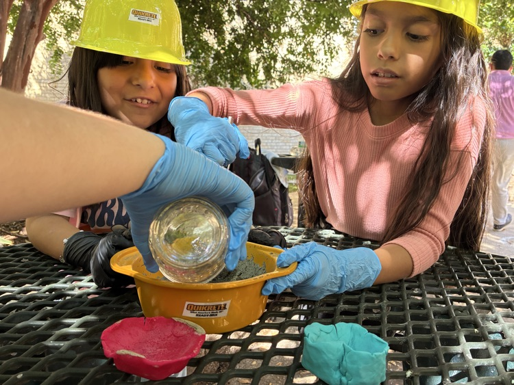 kids working with concrete outside