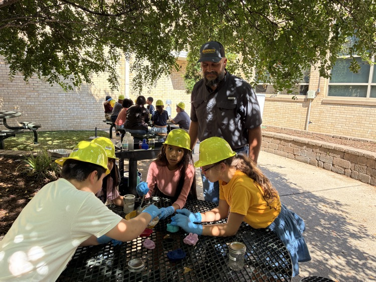 kids working with concrete outside