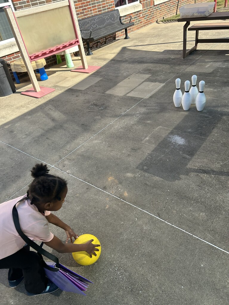 A student bowling