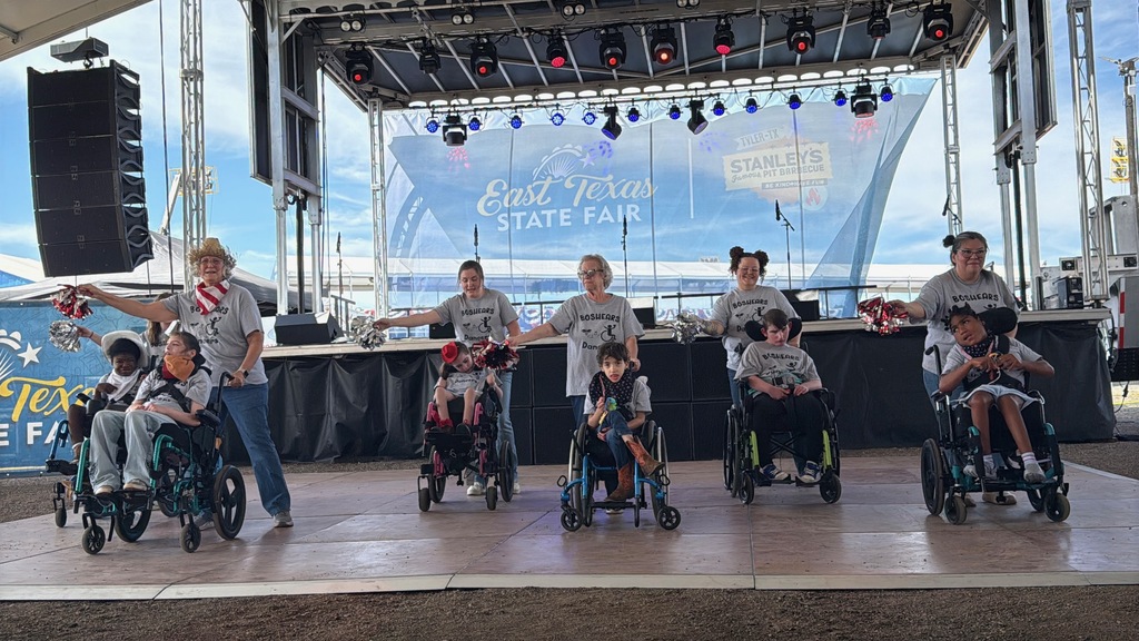 Wheelchair dance team performing on stage at the East Texas State fair
