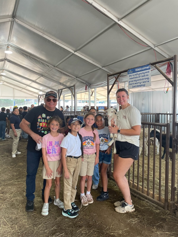 students and teachers at the fair
