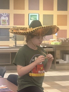 student in sombrero