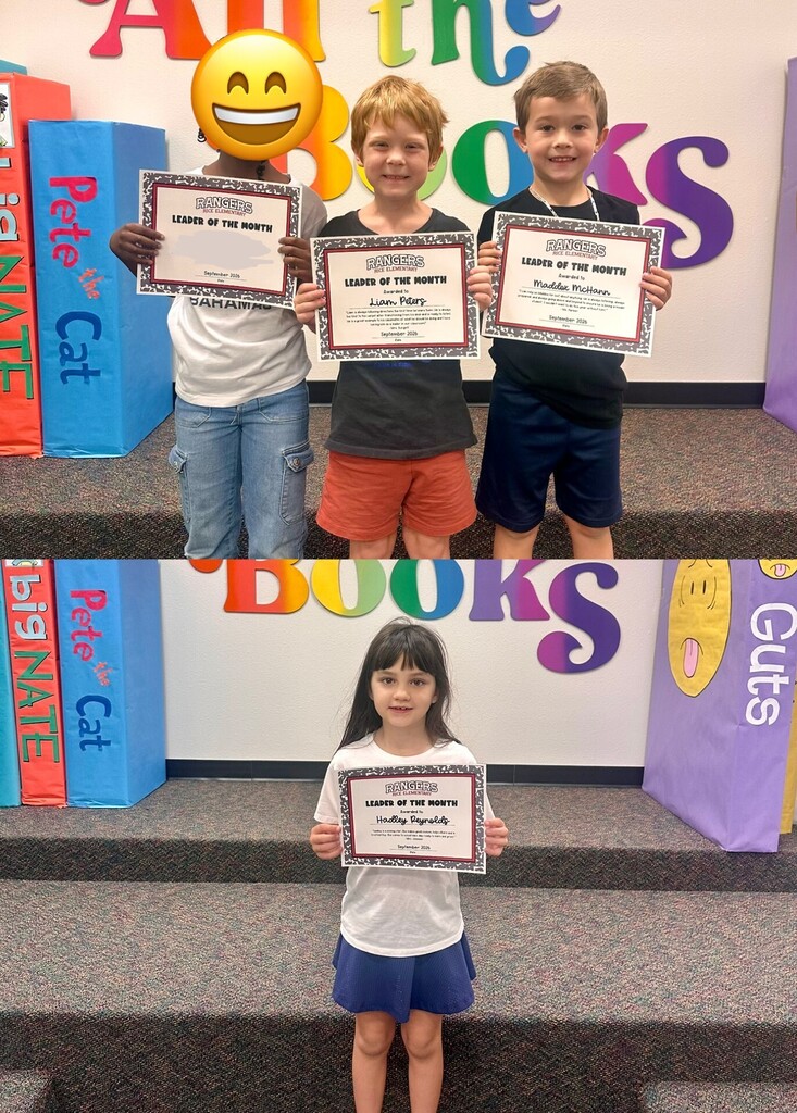 students holding certificates for leader of the month