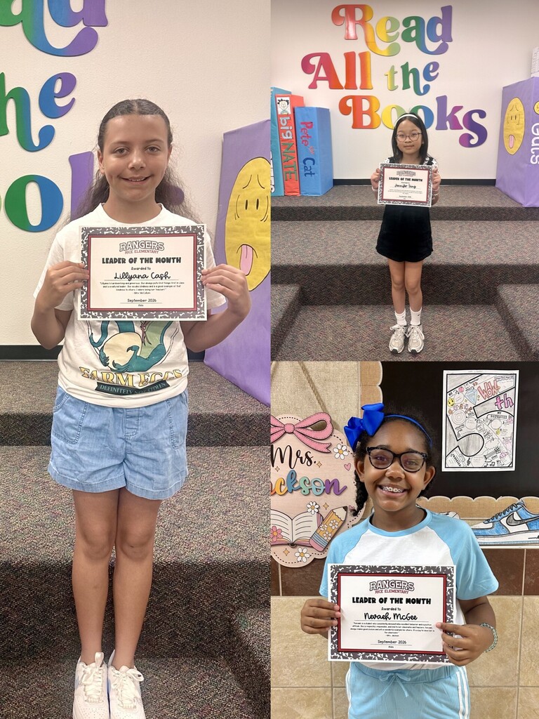 students holding certificates for leader of the month