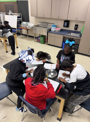 students working the science lab
