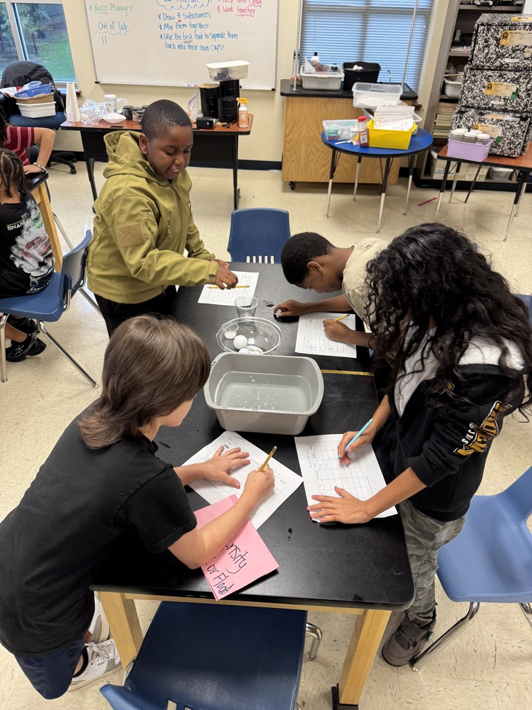 students working the science lab