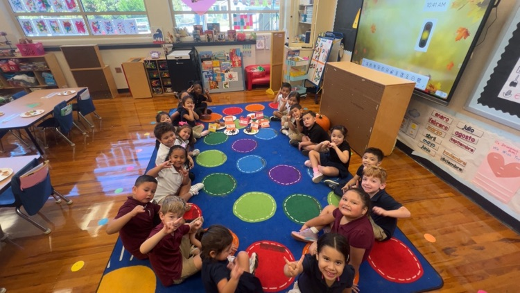 students on the rug