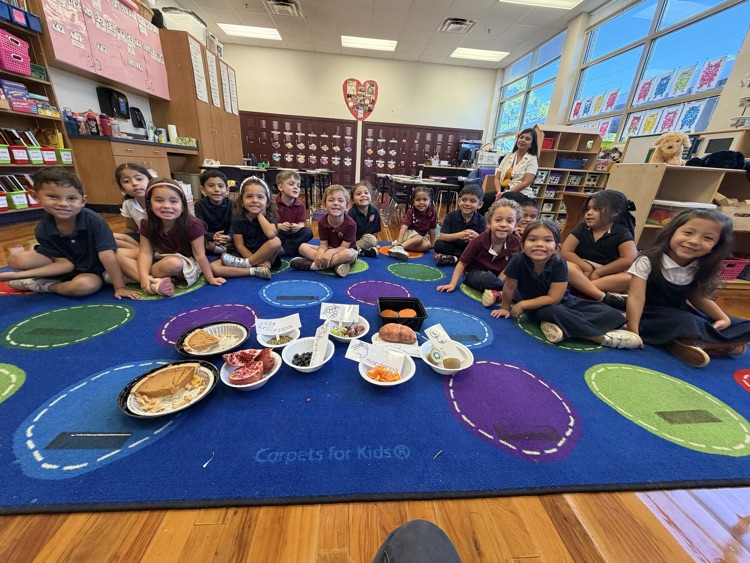 students on the rug