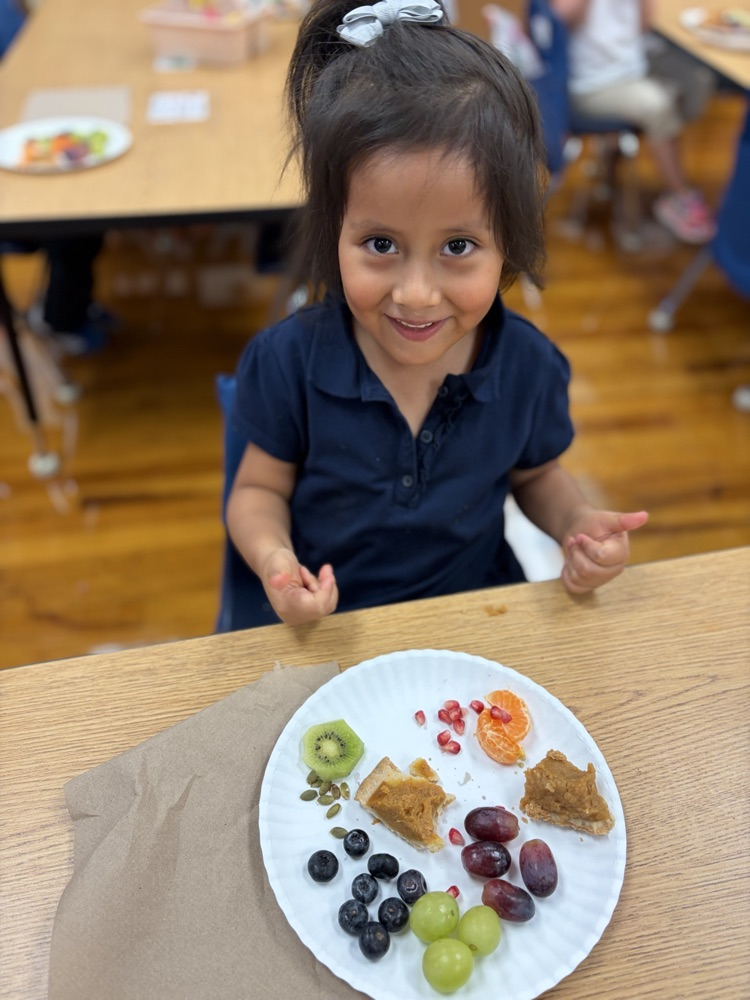girl tasting fall foods