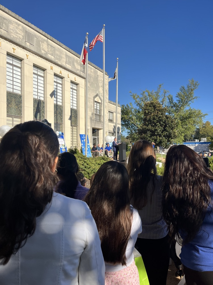 students at flagpole