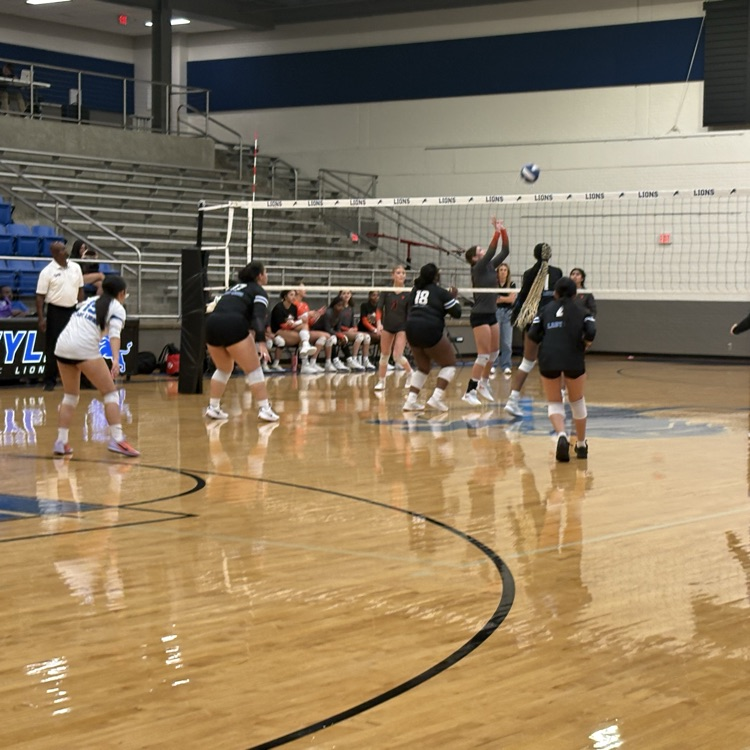 players hitting the ball