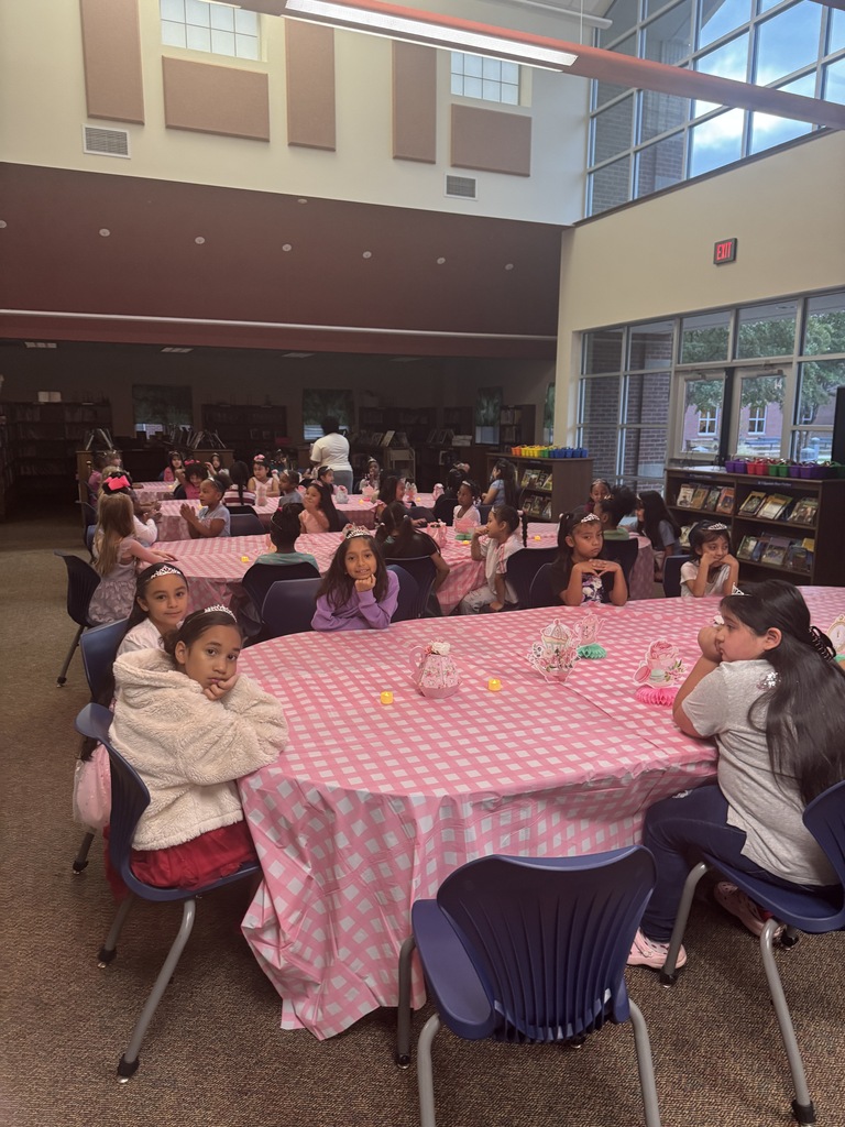 2nd grade students waiting for the Rose Queen at Orr Elementary 