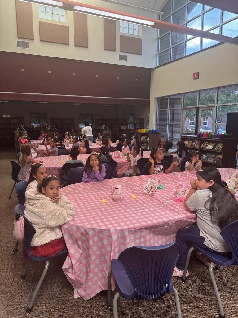 2nd grade students waiting for the Rose Queen at Orr Elementary 