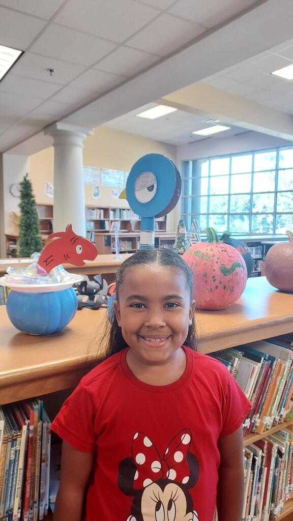 Valerie and her pigeon pumpkin