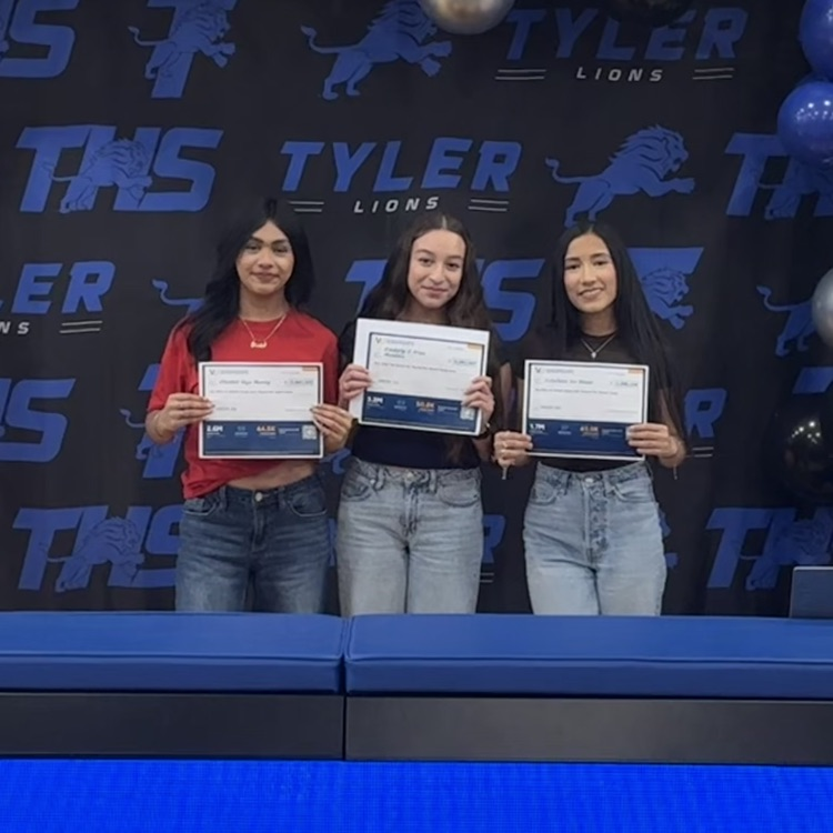 students holding certificates