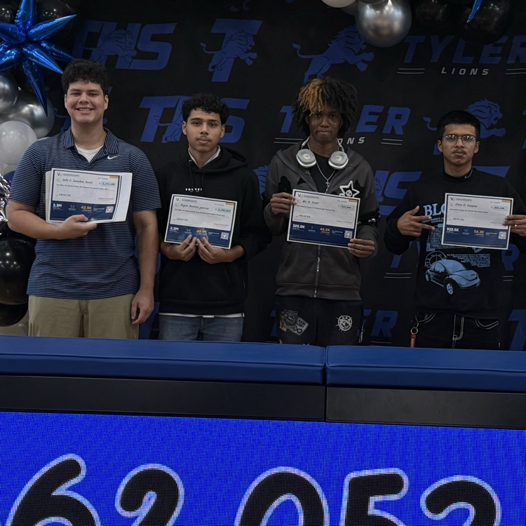 students holding certificates