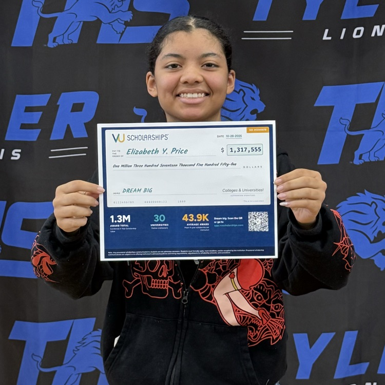 student holding certificate
