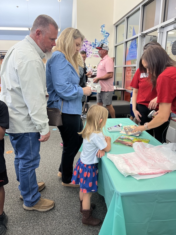 Grandfriend's event shopping the book fair with students