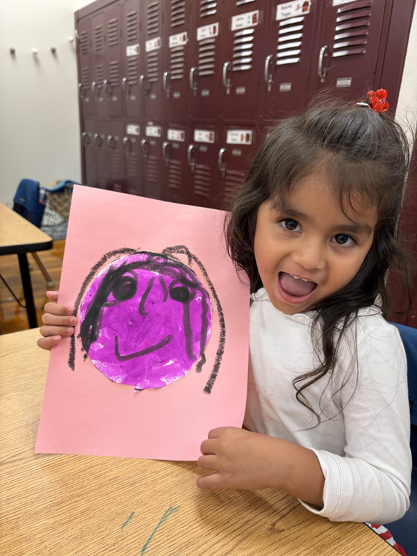 girl next to self portrait