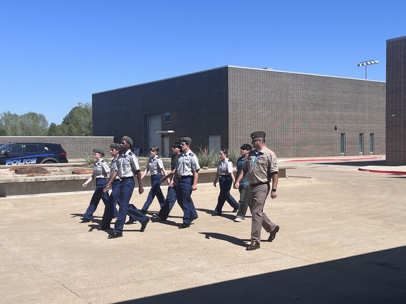 Practicum of Health Science students studying outside.