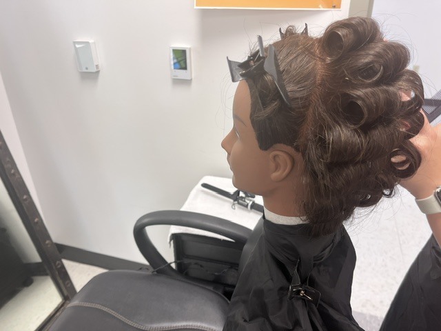 students practicign barrel curls