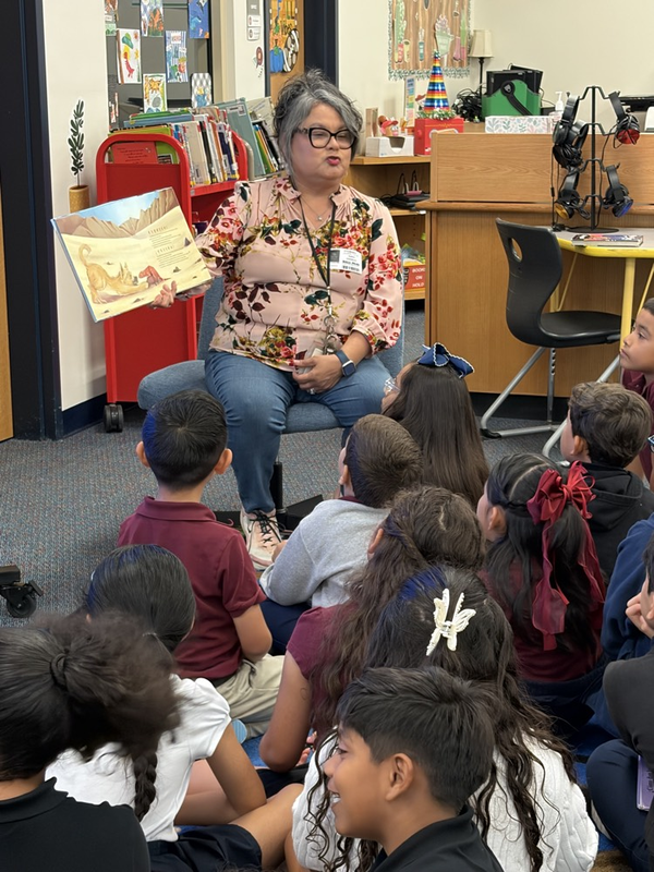 reader and children in the library