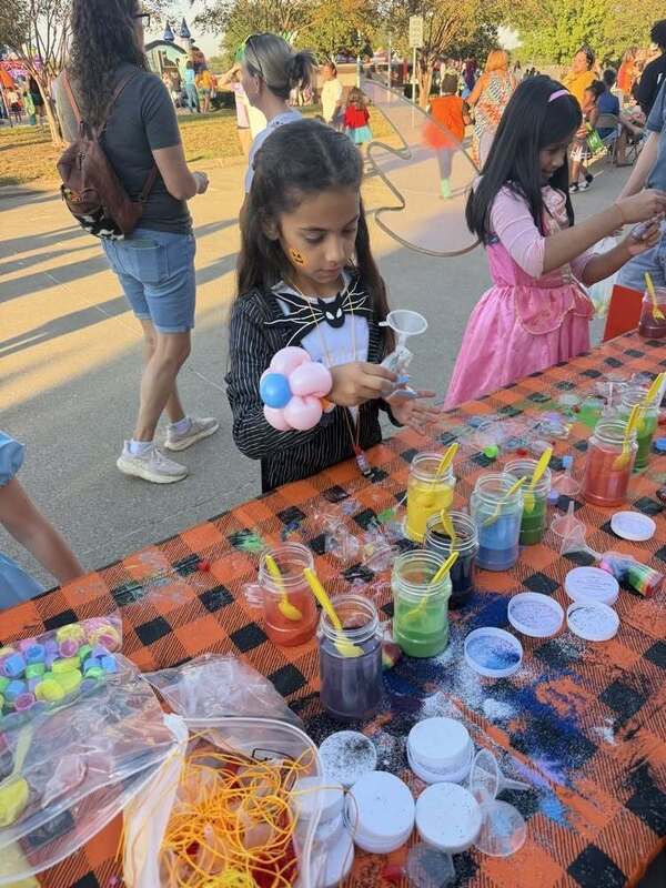 students enjoying the craft table
