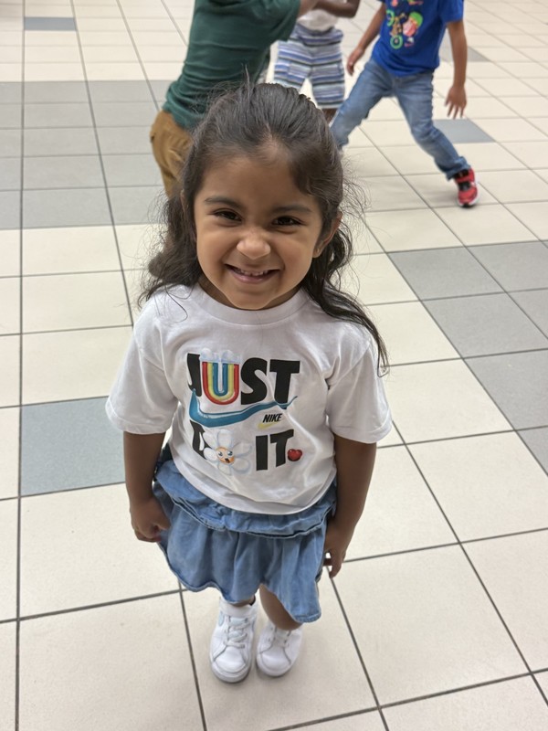 student smiling at dance party