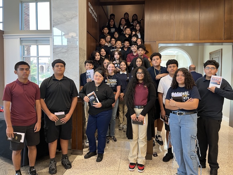 teen boys and girls in hallway and stairway