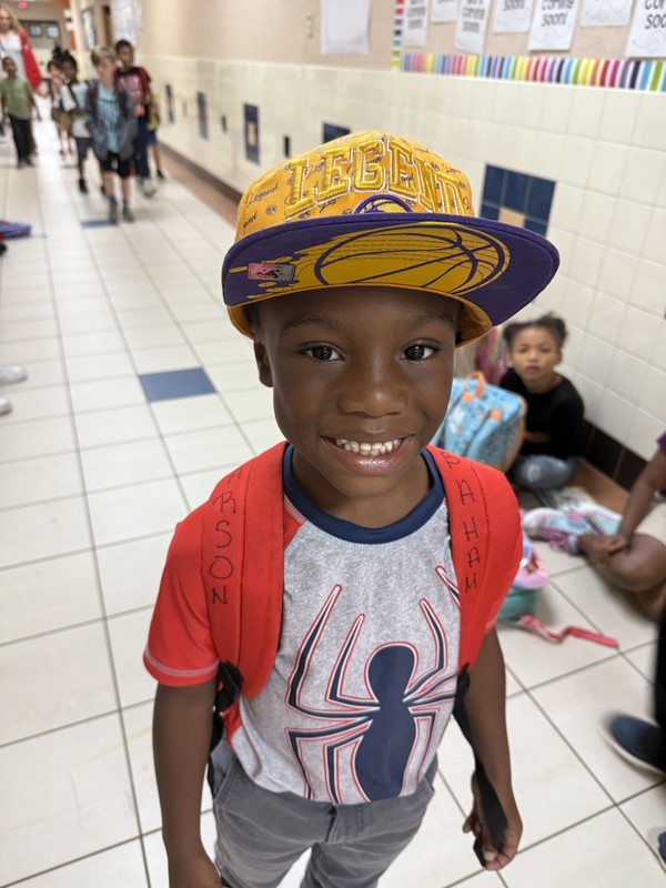 students wearing hats for national attendance awareness week